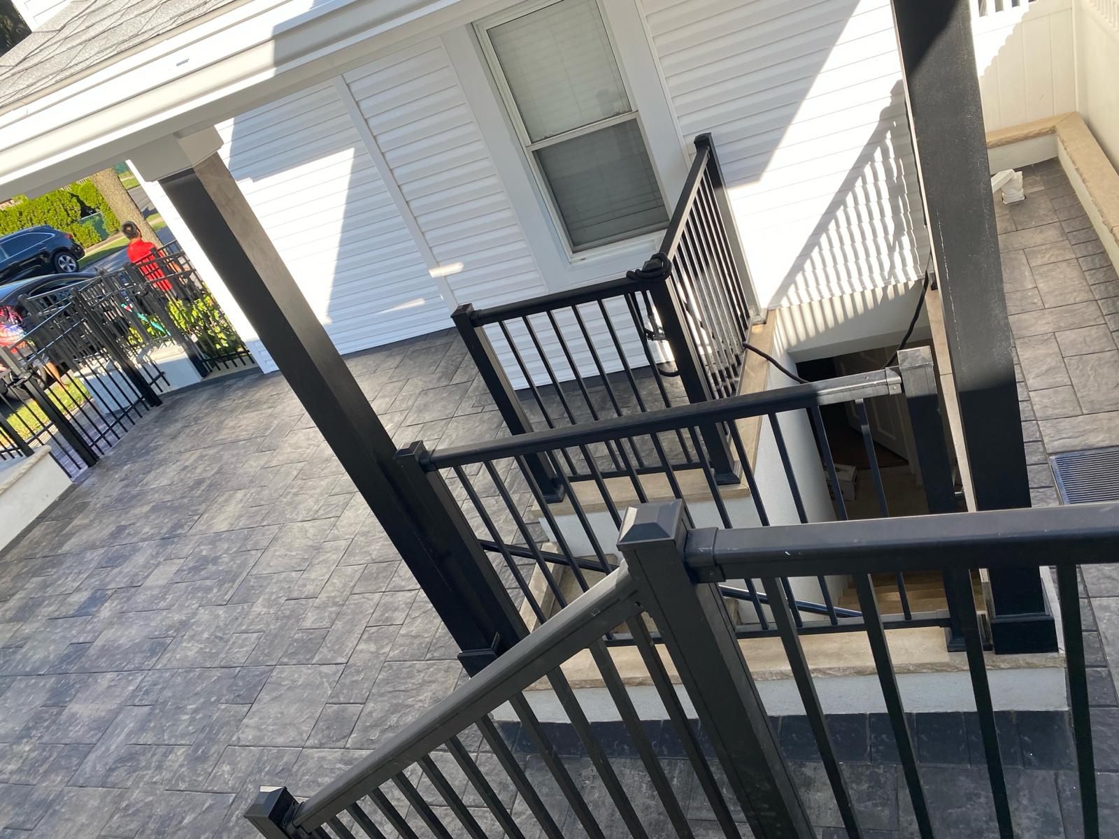 Outside patio with black guard railings